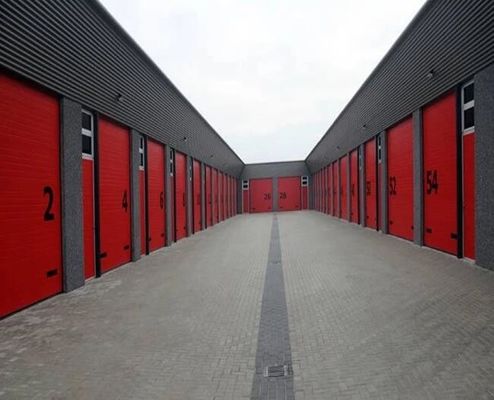 Изолированная пожарным депо эффективность безопасности секционных дверей гаража высокопрочная