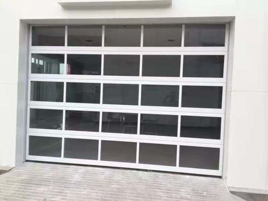 Класс 3 сопротивления ветра двери промышленного гаража гавани загрузки логистической области 40mm стеклянного алюминиевый секционный для пожарного депо